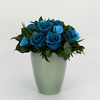Arrangement with blue preserved roses