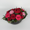 Arrangement with preserved roses and carnations